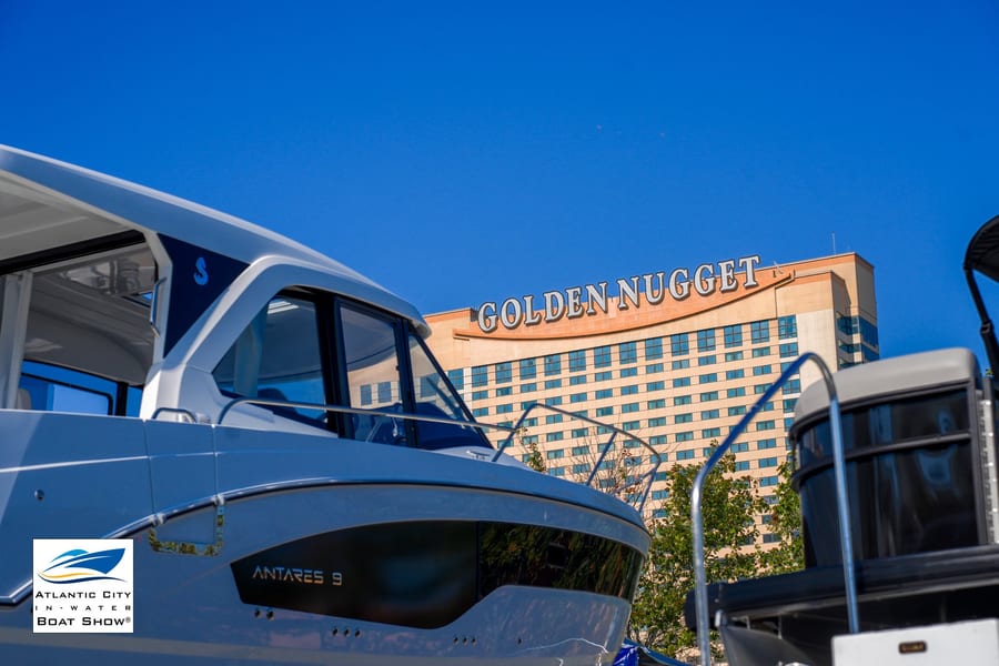 A boat on display in front of the Golden Nugget at the show